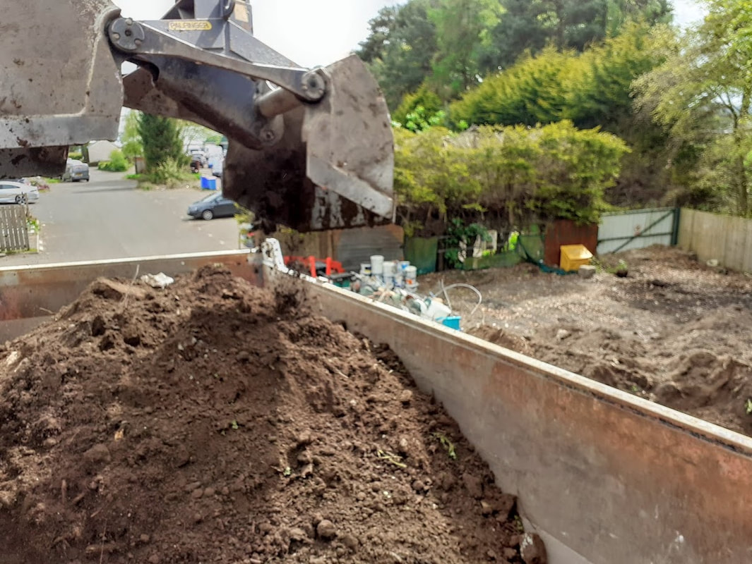 Ground worker preparing site in London